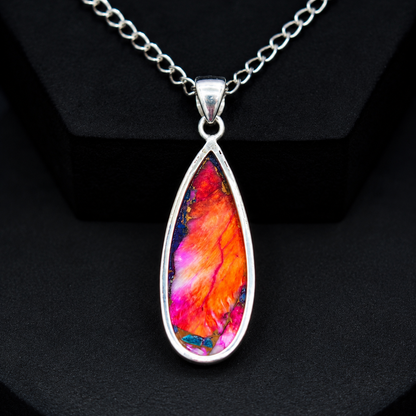 Copper turquoise teardrop pendant necklace laid flat showing full chain length